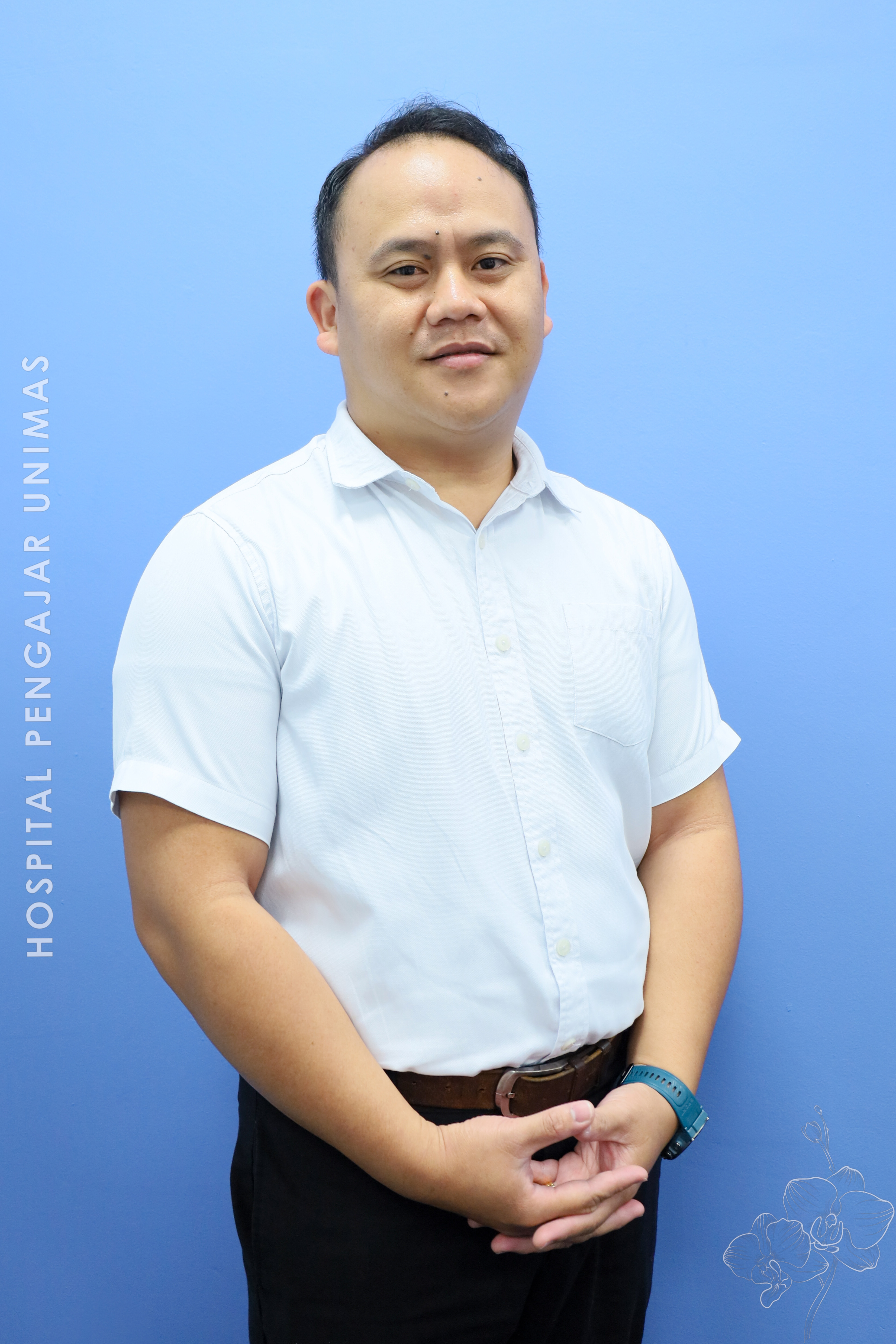 Encik Dominic Anak Rogers